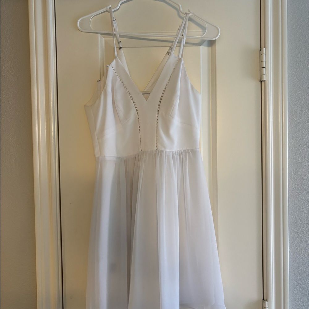 White Sleeveless V-Neck Chiffon Dress